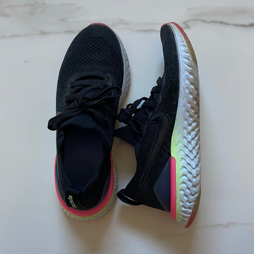 Black Nike Epic React with neon pink and like green detail